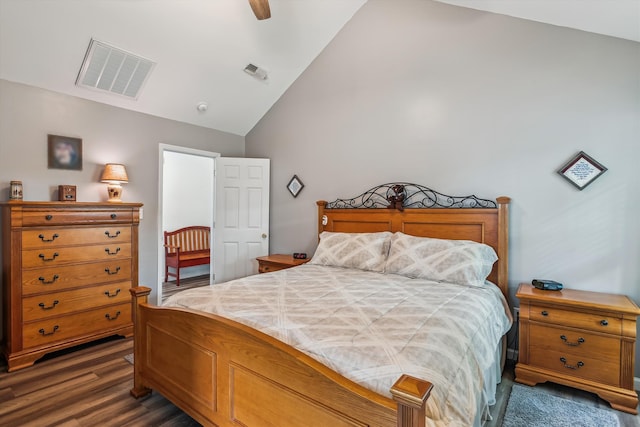bedroom featuring visible vents, dark wood-style flooring, ceiling fan, and lofted ceiling