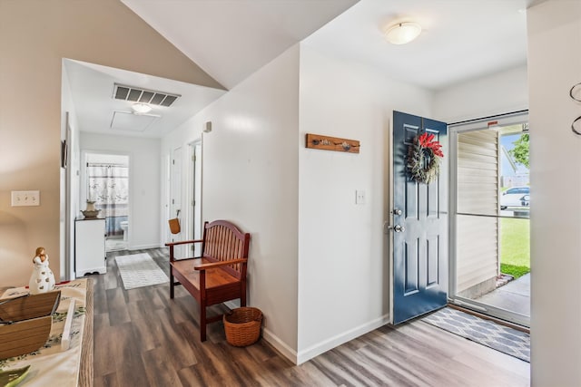 entryway featuring visible vents, wood finished floors, and a healthy amount of sunlight