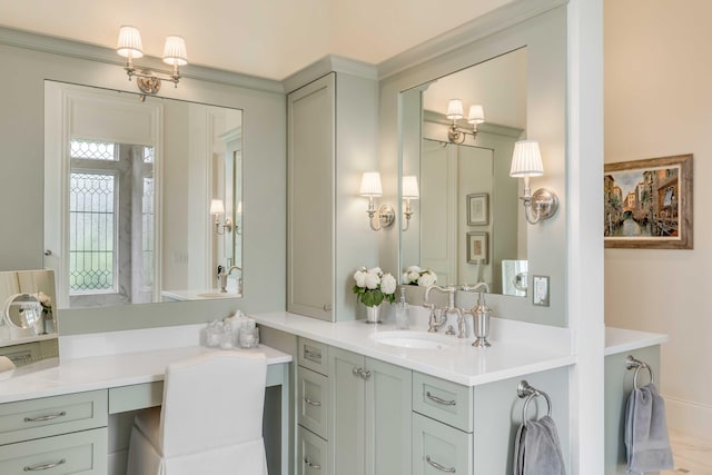 bathroom with vanity and ornamental molding