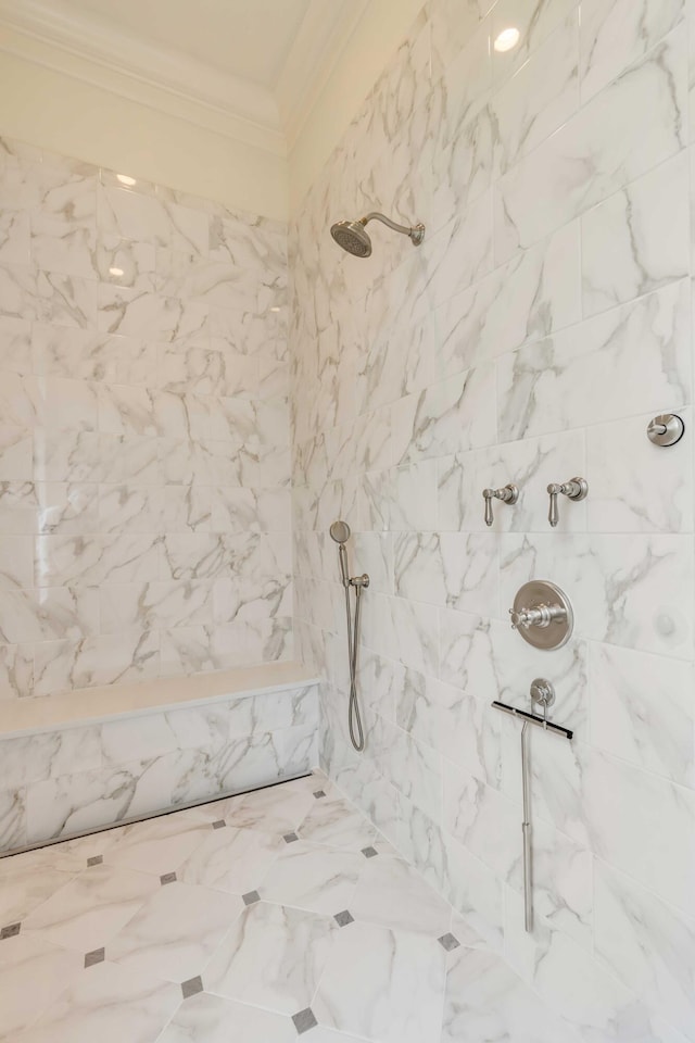 interior details with a tile shower