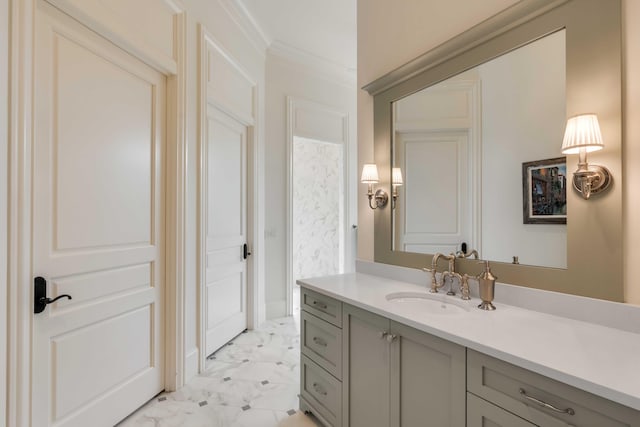 bathroom with vanity and ornamental molding