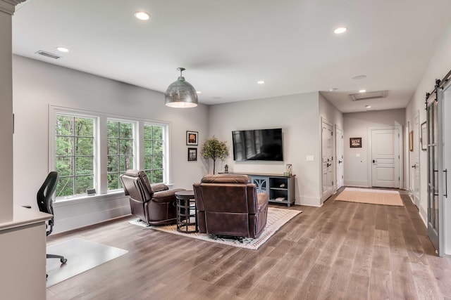 living room with wood-type flooring