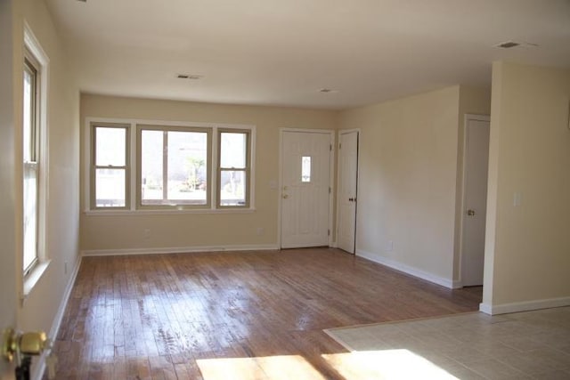 entrance foyer featuring light hardwood / wood-style flooring