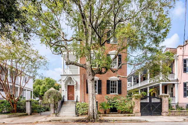 view of front of home with a balcony