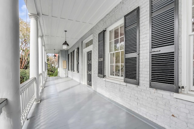 52 Hasell St, Charleston, SC 29401 - view of patio / terrace featuring covered porch