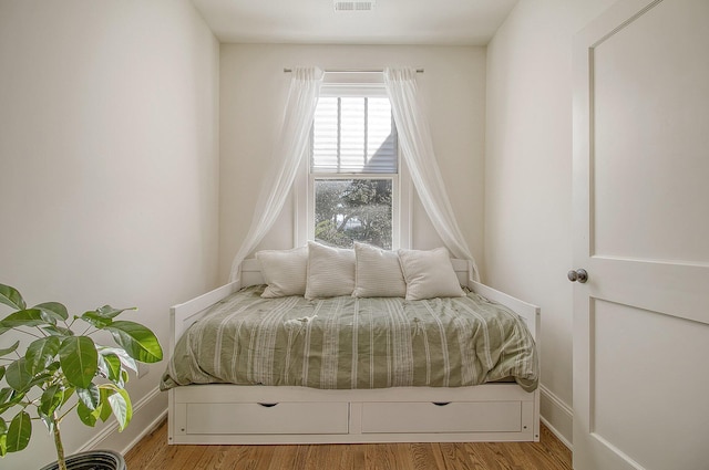 bedroom featuring light hardwood / wood-style floors