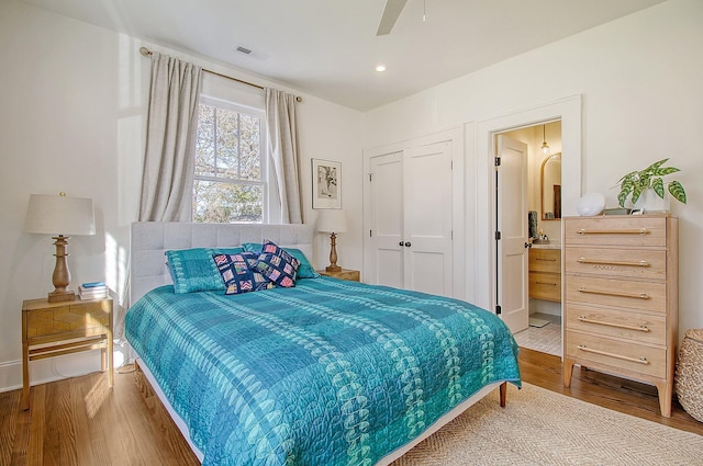 bedroom featuring ceiling fan and wood-type flooring