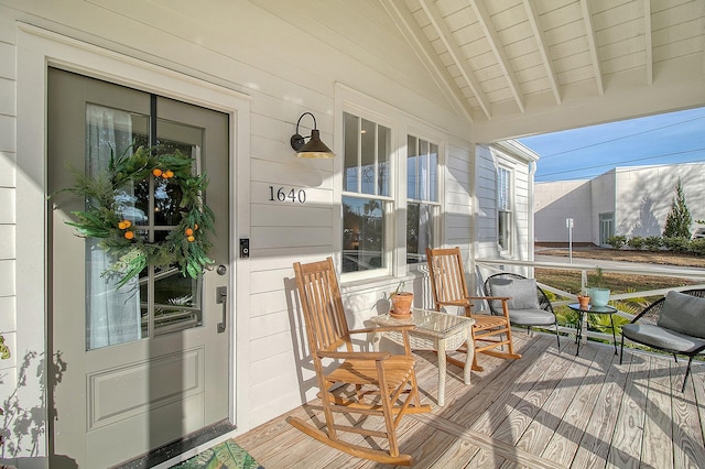 wooden deck featuring a porch