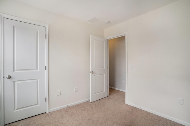 134 Alma Dr, Ladson, SC 29456 - unfurnished bedroom featuring light colored carpet and baseboards