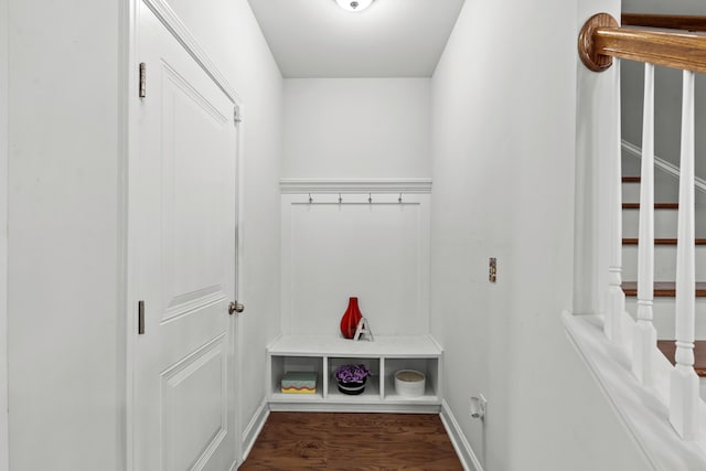 mudroom with baseboards and wood finished floors