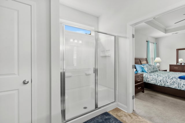 full bathroom featuring ensuite bathroom, ornamental molding, a stall shower, and tile patterned floors