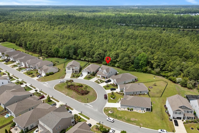 aerial view with a view of trees and a residential view