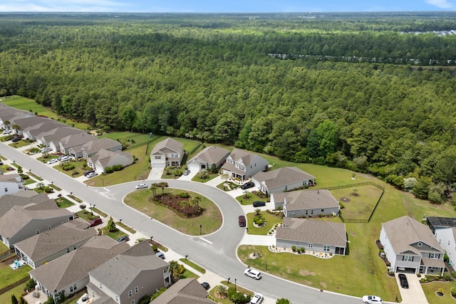 bird's eye view with a view of trees and a residential view