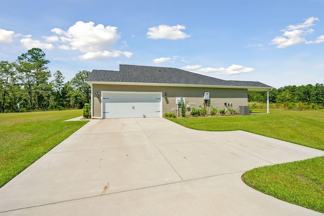 ranch-style home featuring central air condition unit, driveway, an attached garage, and a front yard