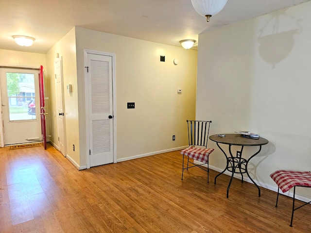 sitting room featuring light hardwood / wood-style flooring