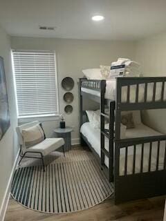 bedroom featuring wood-type flooring