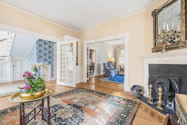 interior space with baseboards, a fireplace with flush hearth, parquet floors, stairs, and crown molding