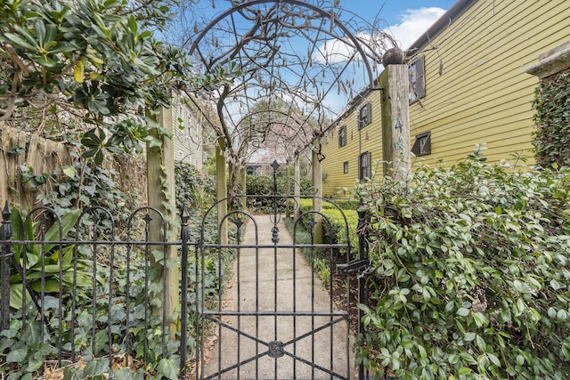 view of gate featuring fence