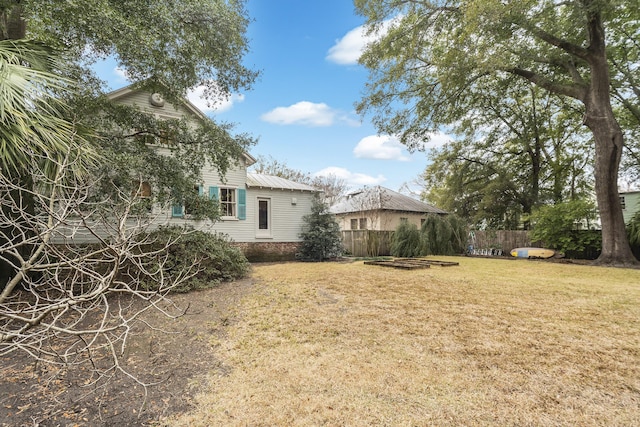 view of yard with fence