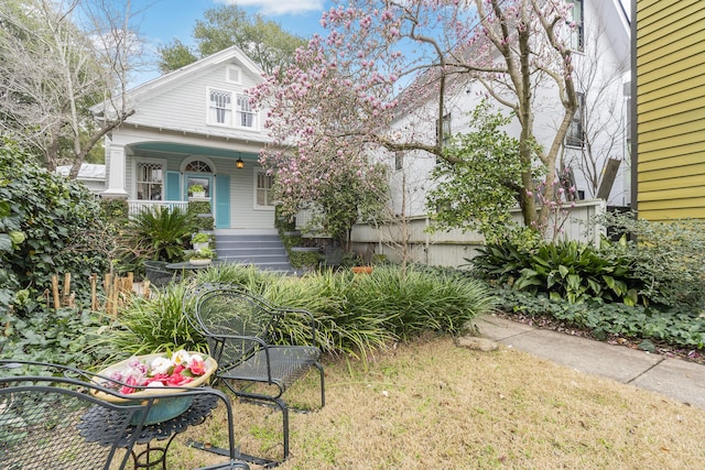 view of front of home featuring covered porch