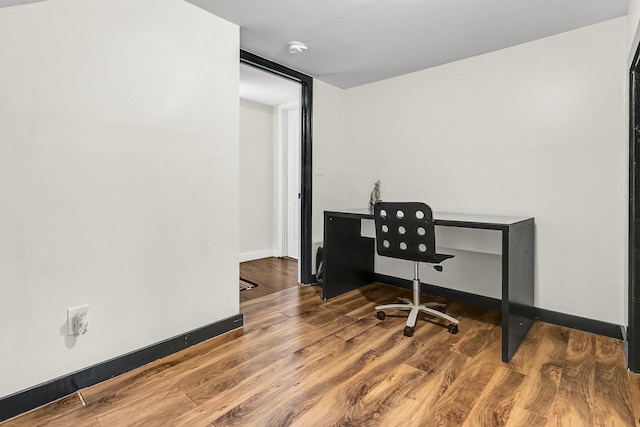 office featuring hardwood / wood-style floors