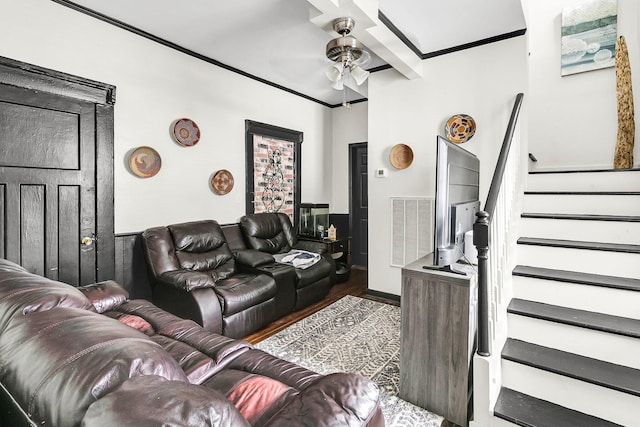 living room with ceiling fan, ornamental molding, and hardwood / wood-style floors