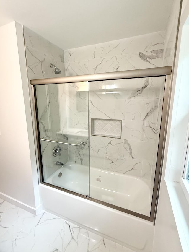 208 Orange St, Walterboro, SC 29488 - full bath featuring shower / bath combination with glass door, marble look tiles, and baseboards