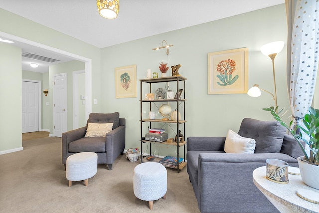 living room with light colored carpet