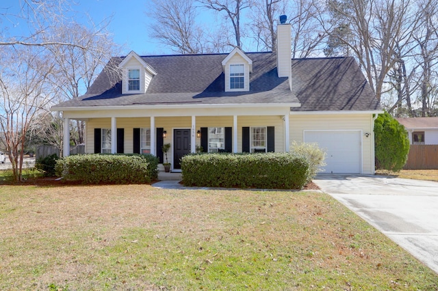 cape cod home featuring concrete driveway, a porch, an attached garage, and a front yard