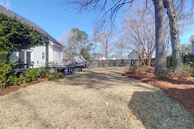 view of yard featuring fence