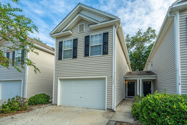 view of front of property with a garage