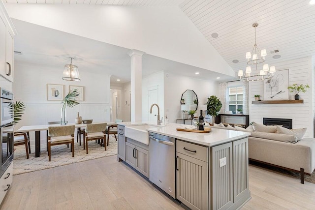 710 Minton Rd, James Island, SC 29412 - kitchen featuring high vaulted ceiling, a sink, gray cabinets, stainless steel appliances, and light countertops