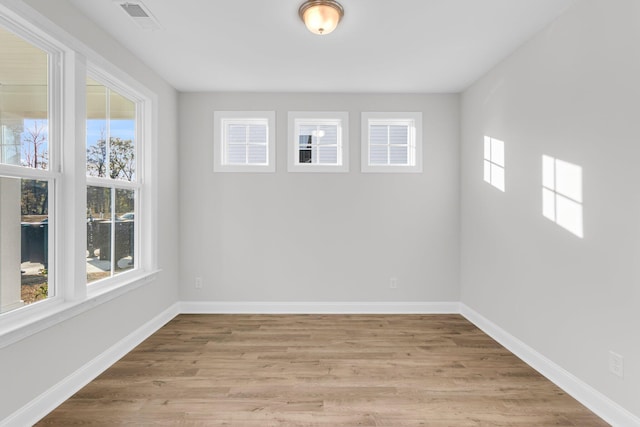 710 Minton Rd, James Island, SC 29412 - empty room with light wood finished floors, baseboards, and visible vents