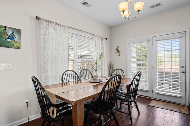 1821 Towne St, Johns Island, SC 29455 - dining space with a chandelier and dark wood-style flooring