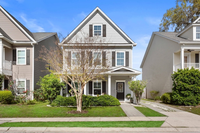 1821 Towne St, Johns Island, SC 29455 - view of front of house with a front lawn, covered porch, and a ceiling fan