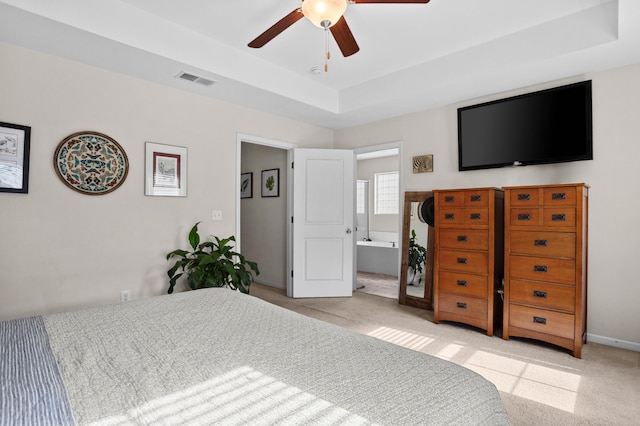 1821 Towne St, Johns Island, SC 29455 - bedroom with light carpet, a raised ceiling, and a ceiling fan