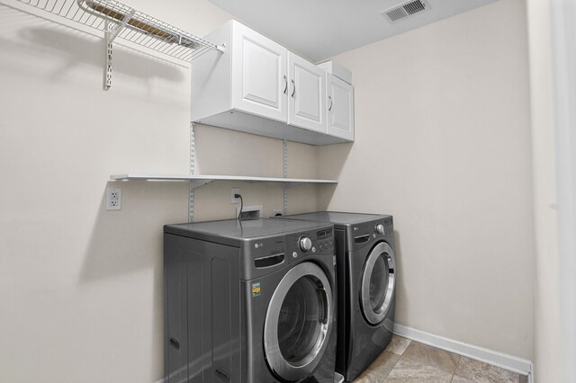 1821 Towne St, Johns Island, SC 29455 - laundry room featuring separate washer and dryer and cabinet space
