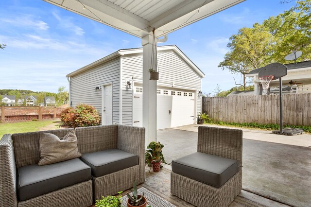 1821 Towne St, Johns Island, SC 29455 - view of patio / terrace with a garage and an outbuilding