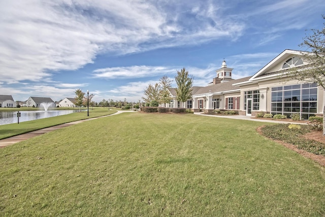 view of yard with a water view