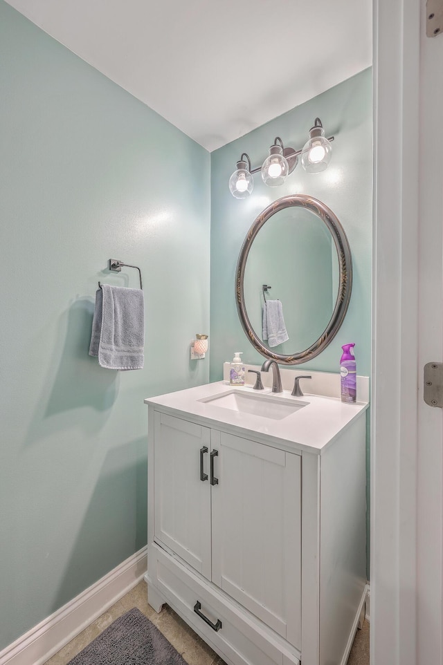 bathroom with vanity and tile patterned flooring