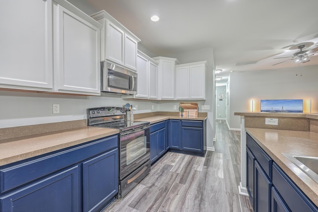 kitchen with ceiling fan, white cabinetry, black range with electric cooktop, light hardwood / wood-style flooring, and blue cabinets