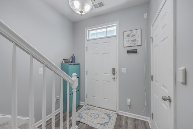 foyer with hardwood / wood-style floors