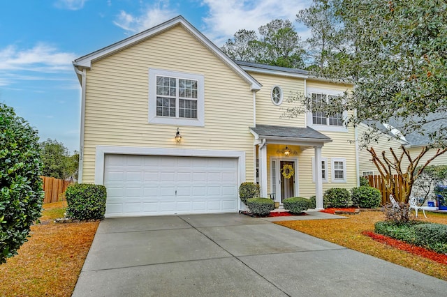 front of property with a garage