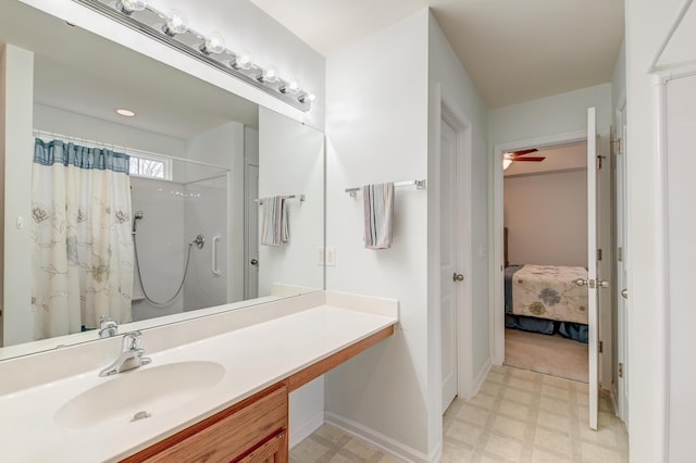 bathroom with vanity and a shower with shower curtain