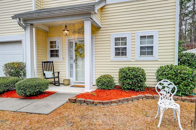 entrance to property featuring a garage