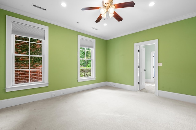 empty room with ornamental molding, visible vents, recessed lighting, and carpet floors