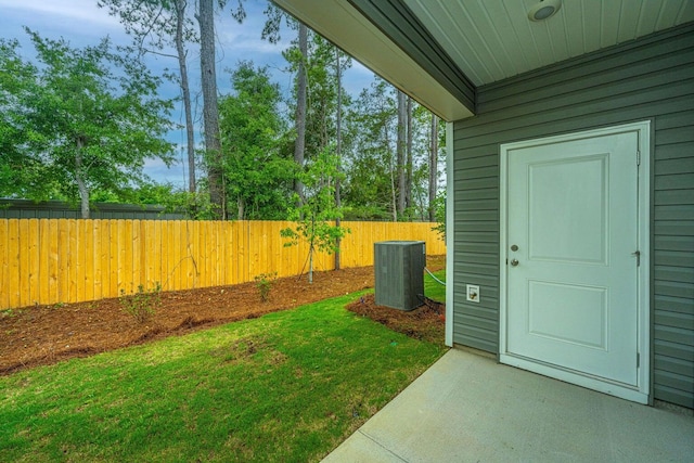 902 Twin Rivers Dr, Wando, SC 29492 - view of yard featuring central air condition unit and fence
