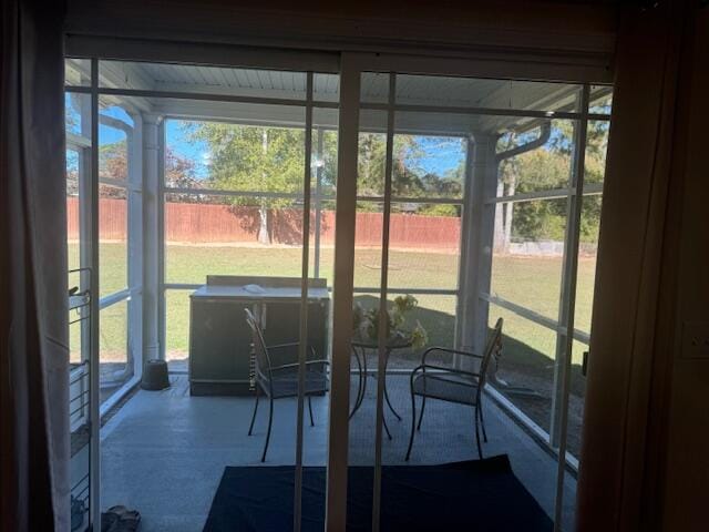 sunroom / solarium with a wealth of natural light