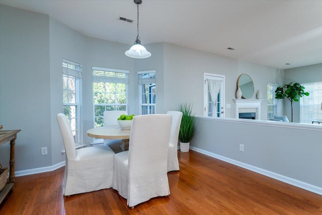 dining area featuring hardwood / wood-style flooring