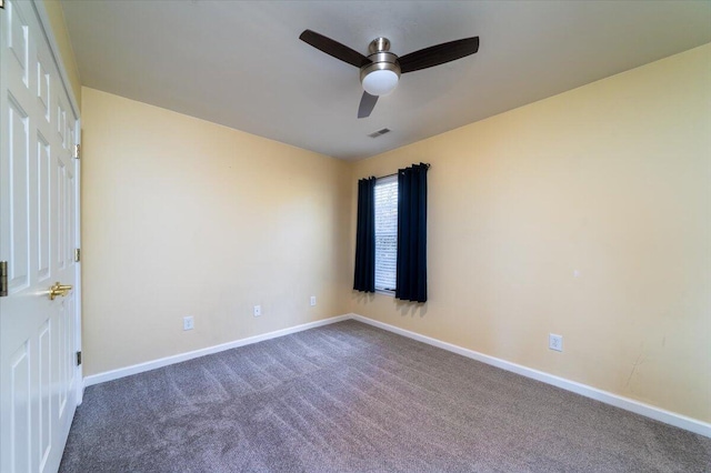 carpeted empty room with ceiling fan